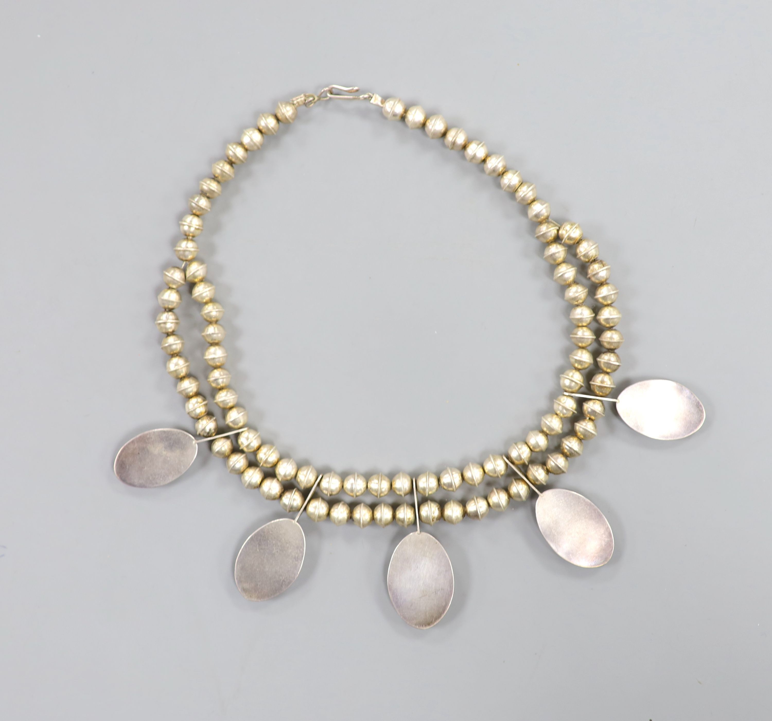 A 20th century South American? white metal and turquoise set drop necklace, approx. 44cm, gross weight 52 grams.